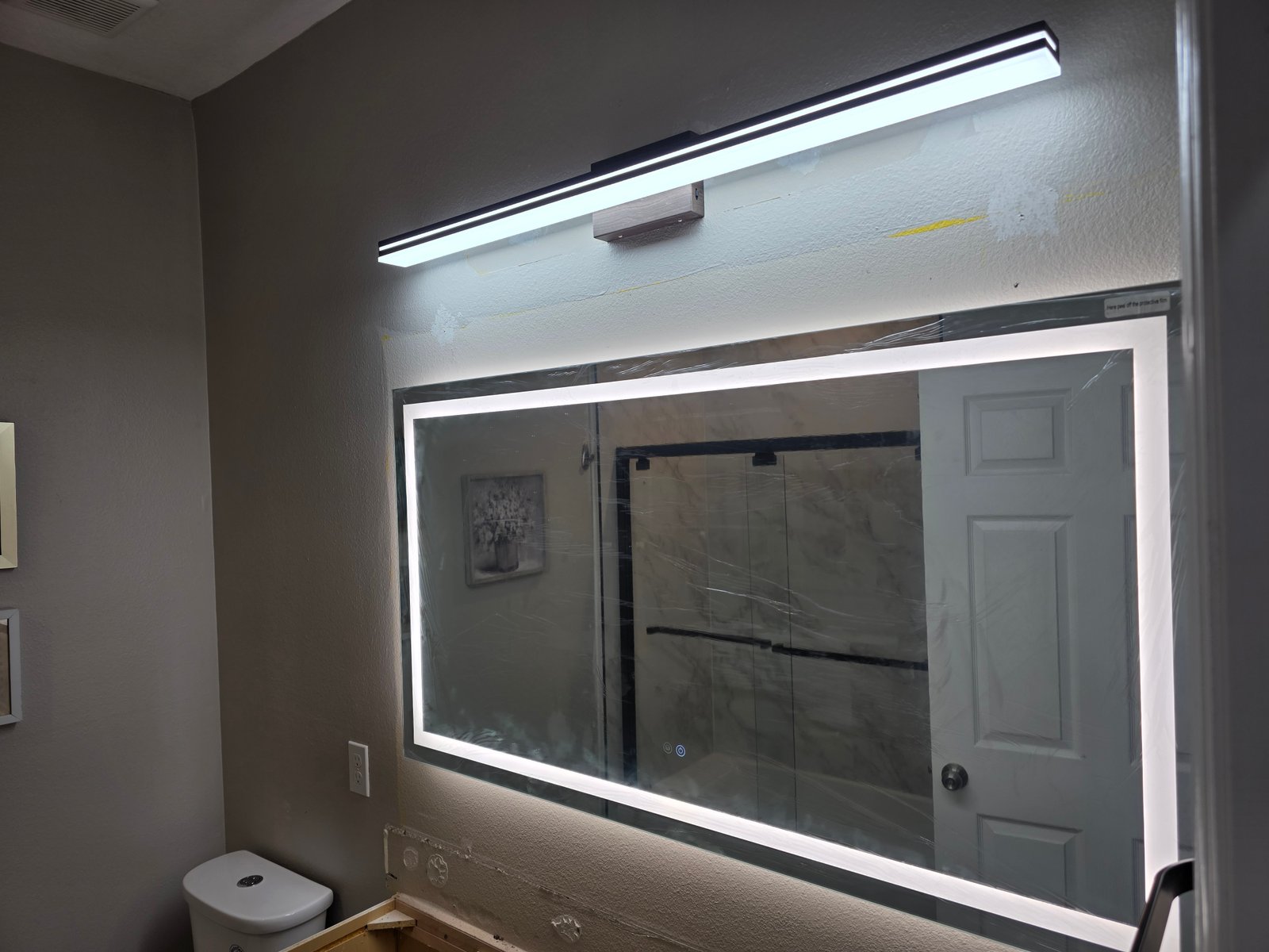 LED bathroom mirror installation