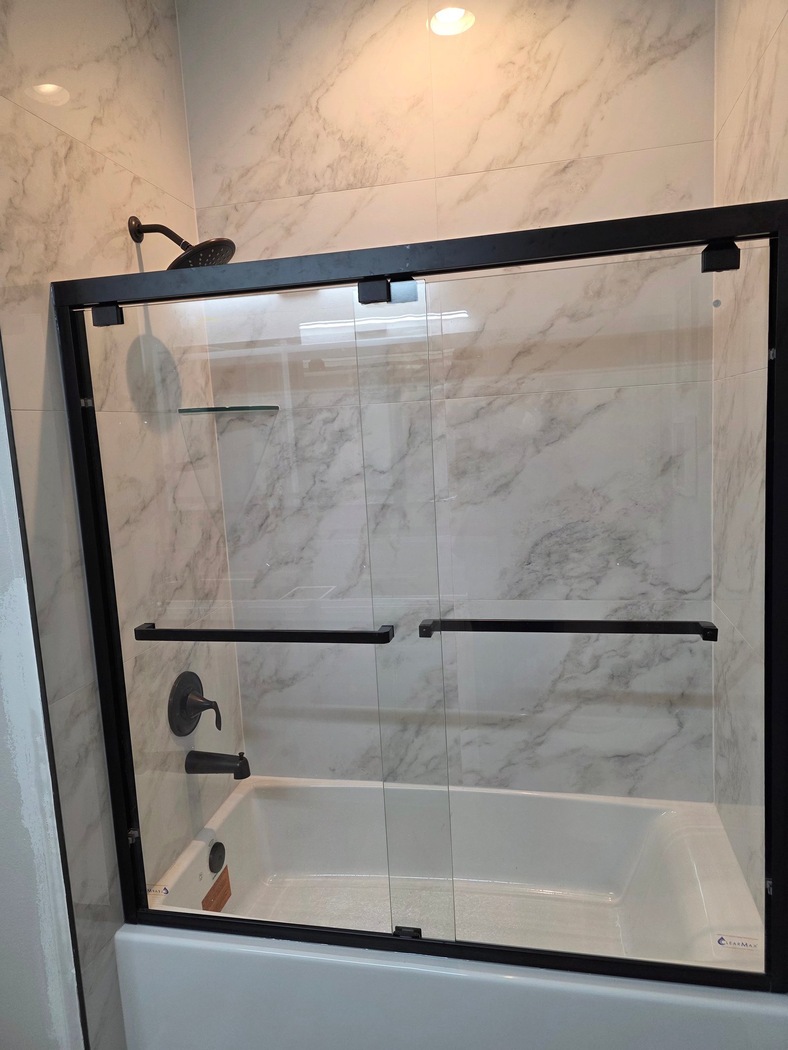 Glass bathtub enclosure installation